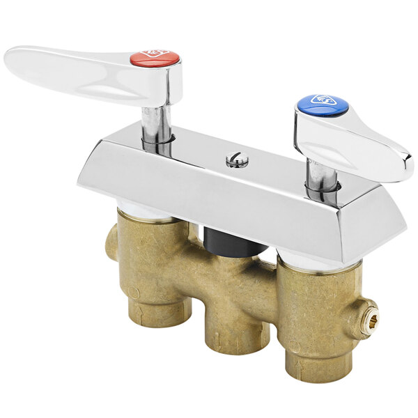 A close up of a T&S wall mounted faucet with brass valves and blue and red lever handles.