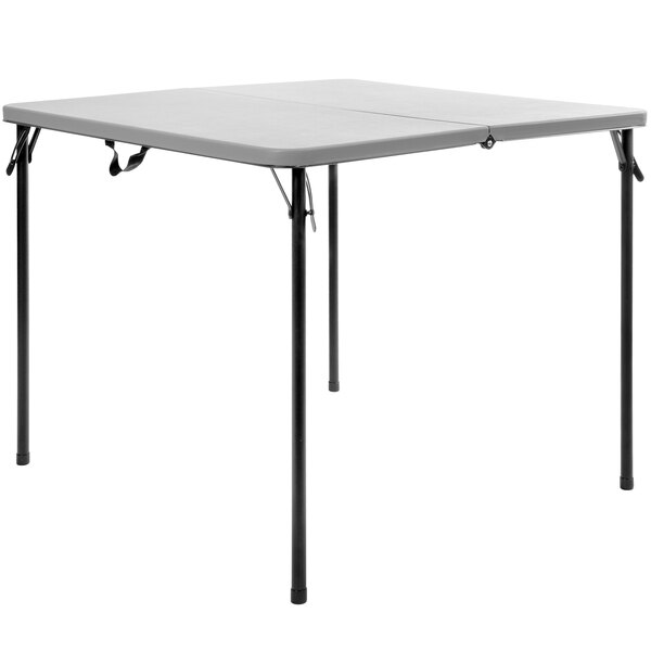 A square gray plastic folding table with gray legs.