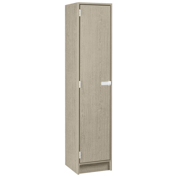 A tall wooden I.D. Systems locker with a single door and two shelves with a white handle.