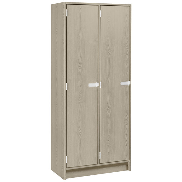 A natural elm I.D. Systems double door storage locker with two shelves.