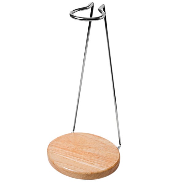 A Decantus aerator table stand with wood base.