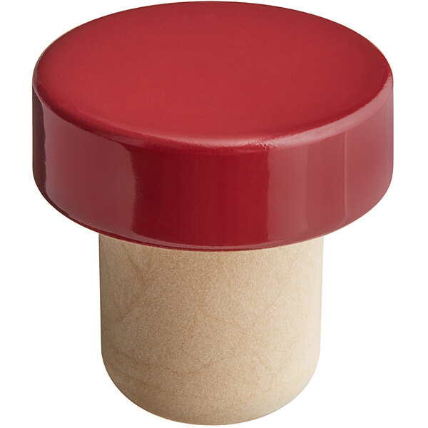 A Franmara red wine stopper with a red aluminum top.