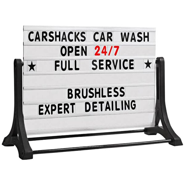 A white Aarco letterboard panel with black text reading "car wash full service expert brushing"