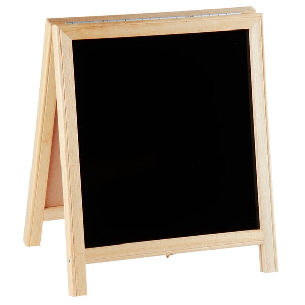 A wooden A-frame black board with white background.