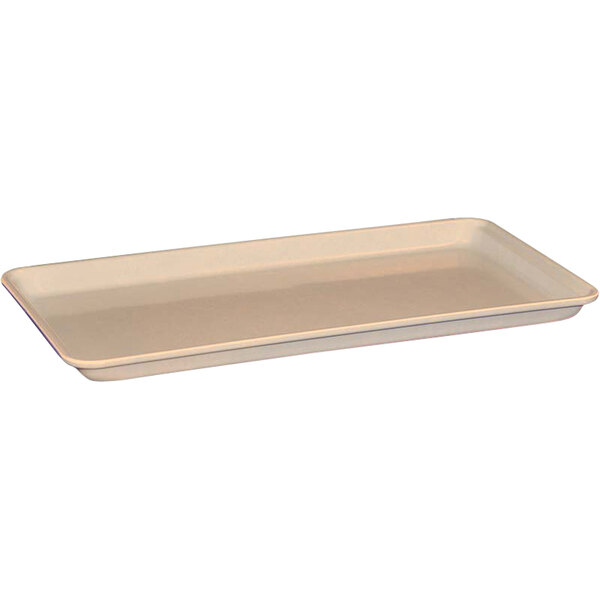 A white rectangular MFG Tray on a counter.