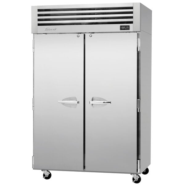 A large silver Turbo Air Premiere Pro Series reach-in freezer with two solid doors.