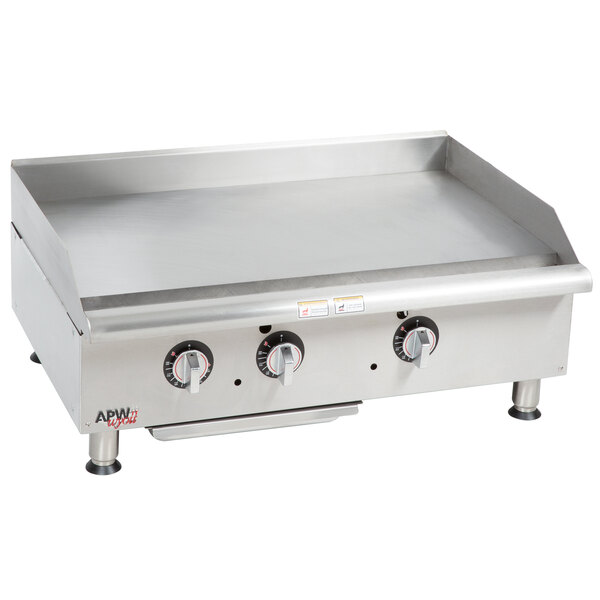 A stainless steel APW Wyott countertop gas griddle.