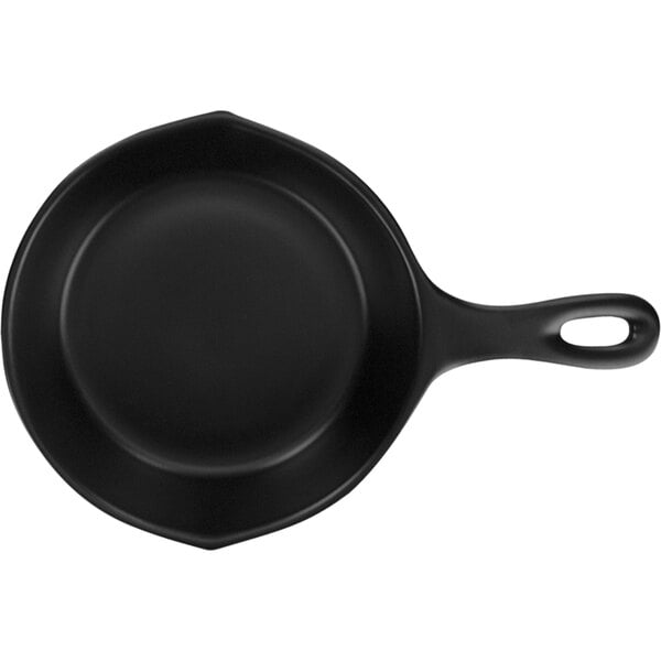 An International Tableware black stoneware serving skillet with a handle.