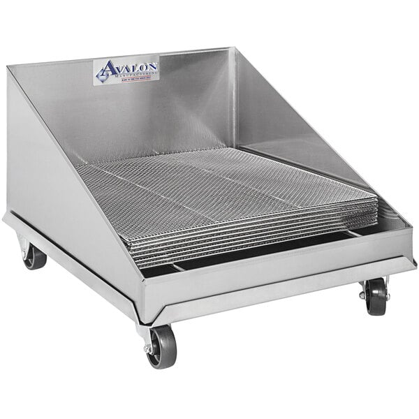 A metal cart with a stack of stainless steel Avalon Manufacturing ASSD20 screen drains.