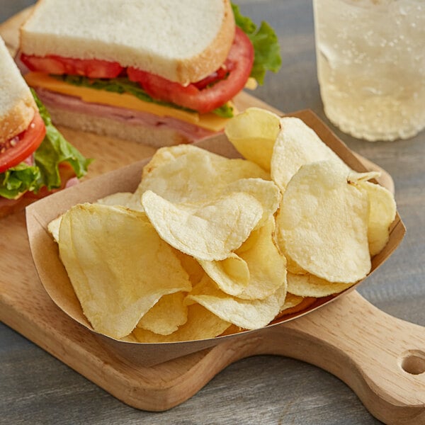 A plate with a sandwich and Good's Red Homestyle Potato Chips.