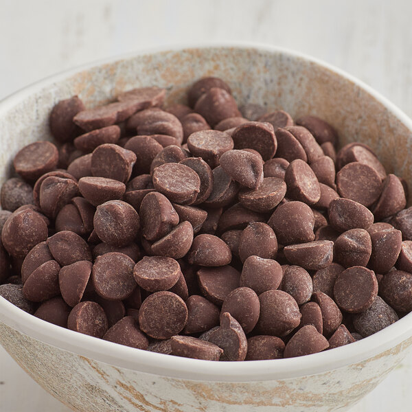 A bowl of Enjoy Life dark chocolate chips.