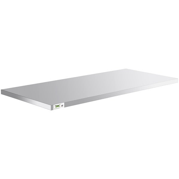 A stainless steel rectangular shelf for a table with a green label.