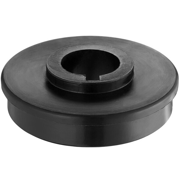 A black round flange with a hole in the center.