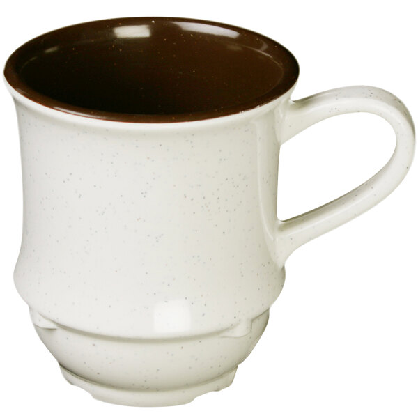 A white and brown Thunder Group Arcadia coffee mug with a white handle.