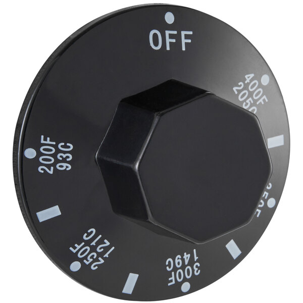 A black Carnival King temperature dial knob with white text.