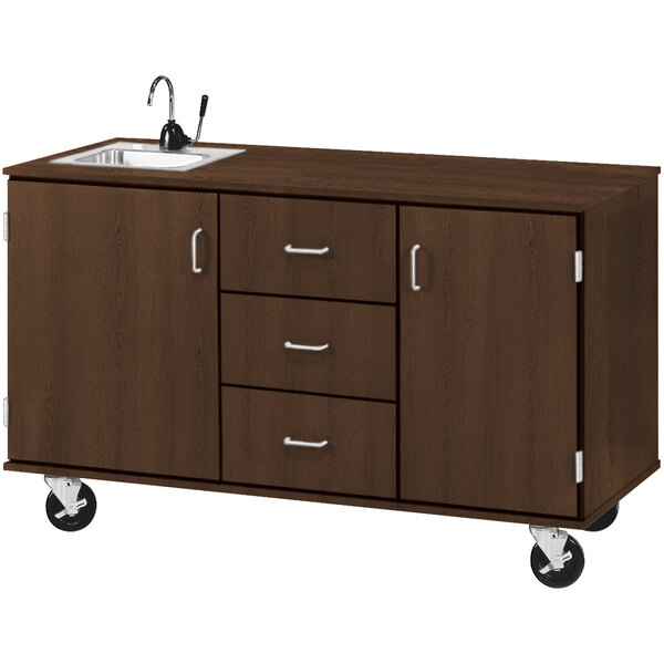 A brown cabinet with a sink and drawers.