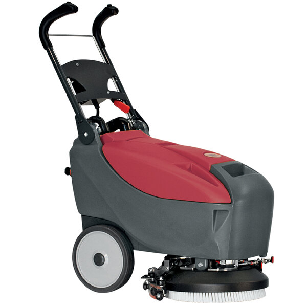 A red and black Minuteman E14 walk behind floor scrubber with wheels and a handle.