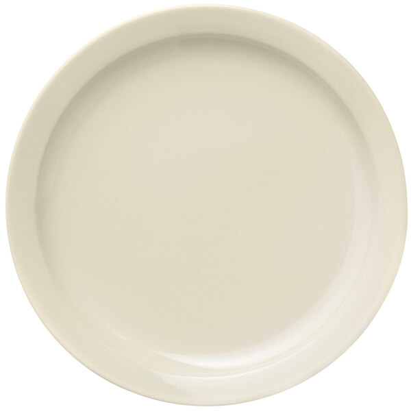 A close-up of a Libbey Porcelana white porcelain plate with a narrow white rim.