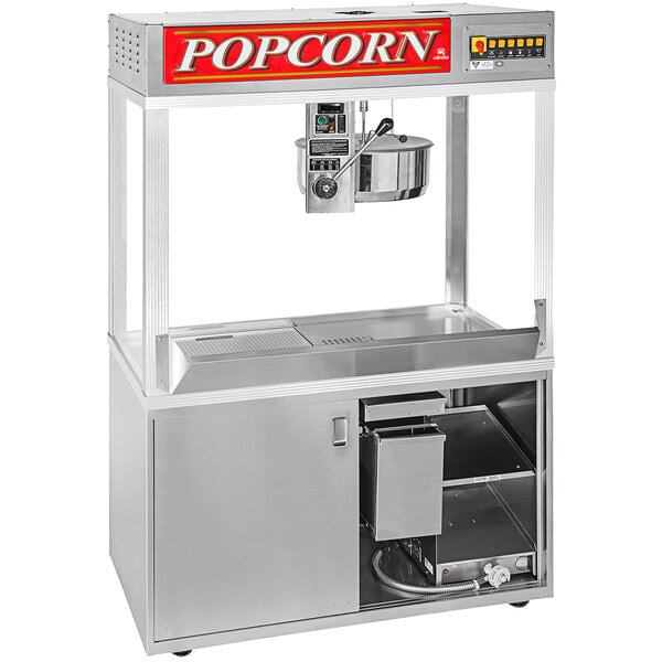 A Cretors popcorn machine with a stainless steel cabinet and a large pot.