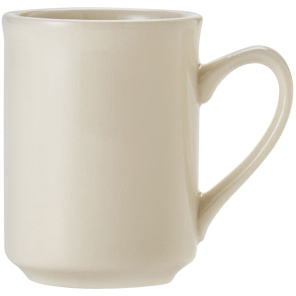 A close-up of a Libbey Porcelana white coffee mug with a handle.