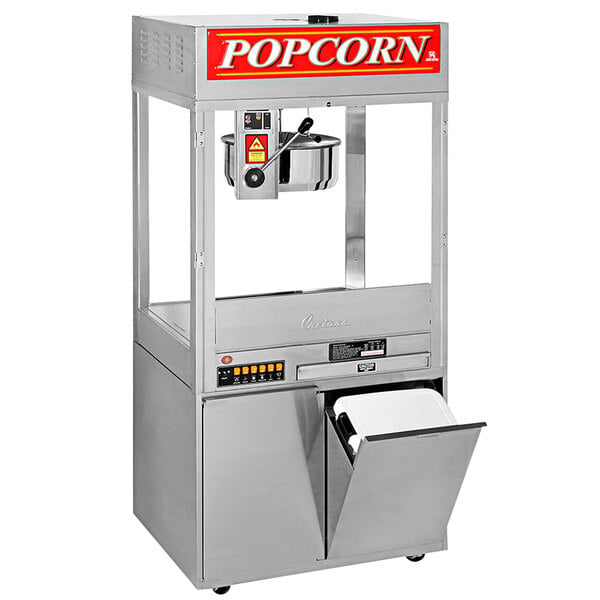 A Cretors counter model popcorn popper with a lid.