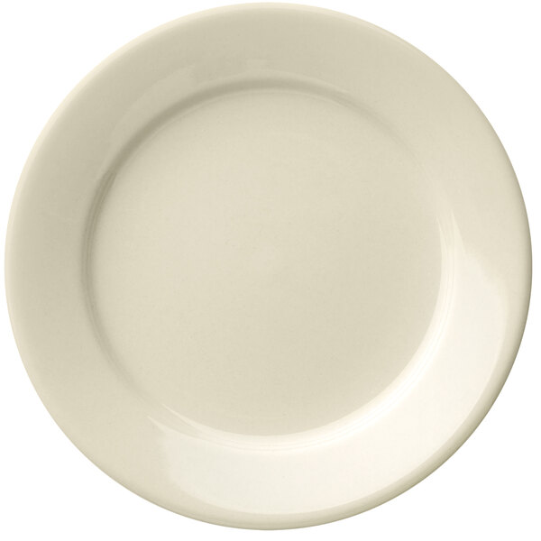 A close up of a Libbey Porcelana white porcelain plate with a plain edge.