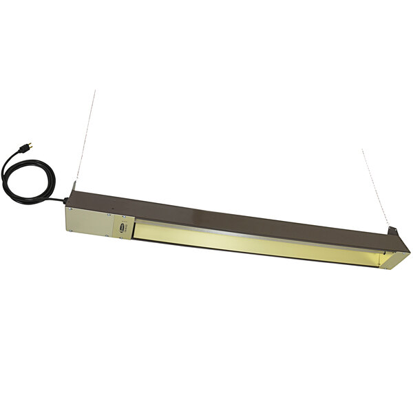 A long rectangular brown TPI quartz electric infrared heater with a cord.