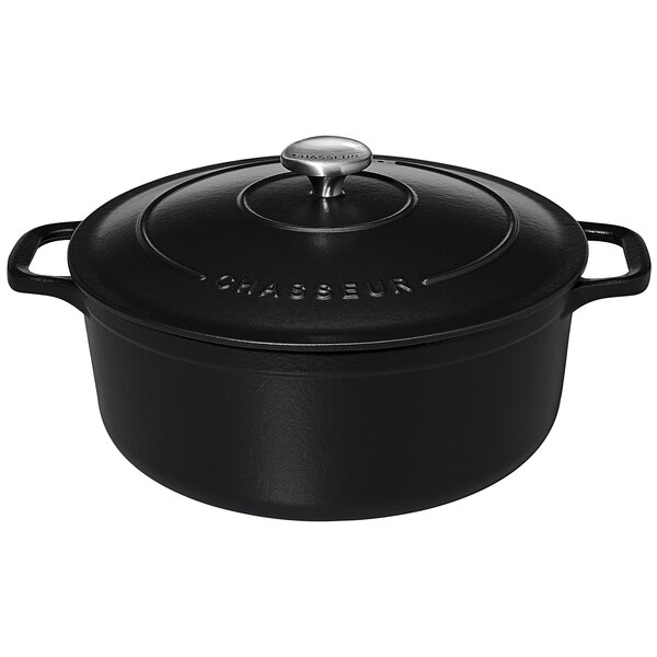 A black Chasseur enameled cast iron dutch oven with a lid.