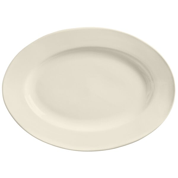 A Libbey Porcelana white oval platter with a wide rim.