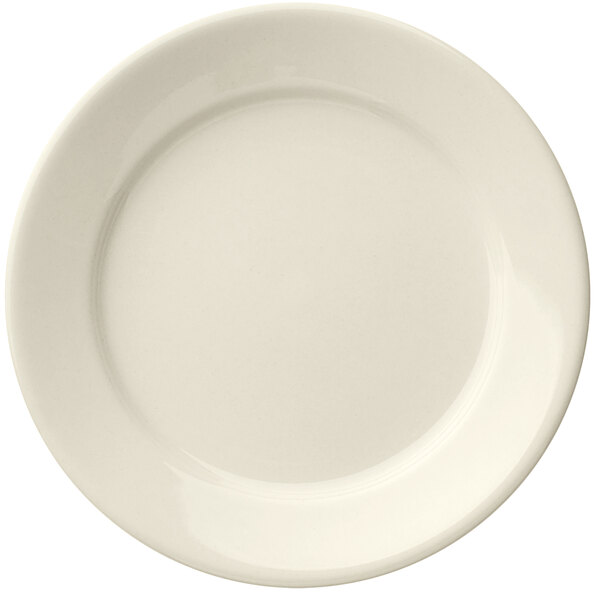A white Libbey Porcelana wide rim porcelain plate with a plain edge.