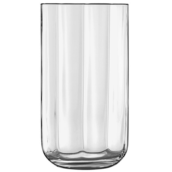 A close up of a Luigi Bormioli Jazz clear glass with a curved edge.