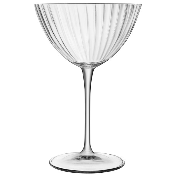 A clear Luigi Bormioli martini glass with a curved stem.