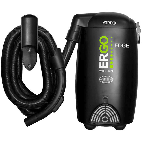 An Atrix Ergo Edge wall mount vacuum cleaner with a hose and handle.