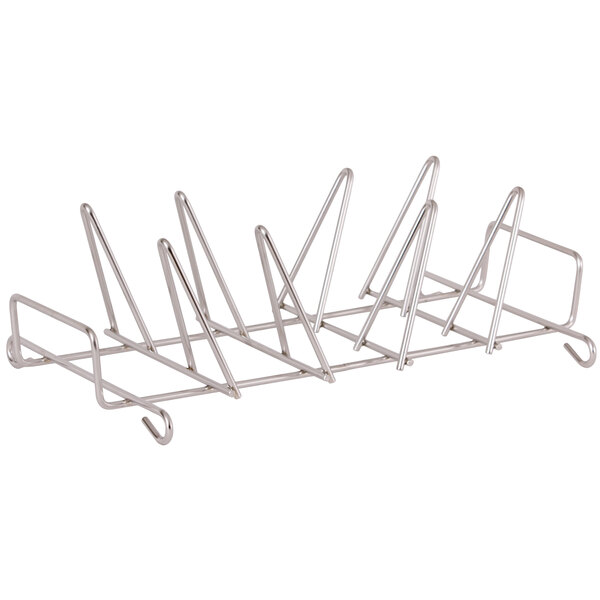 An Alto-Shaam roasting rack with metal rods holding 8 chickens.