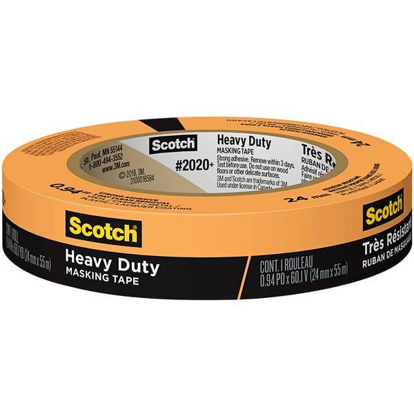 A roll of 3M Scotch orange heavy-duty masking tape with black and yellow text.