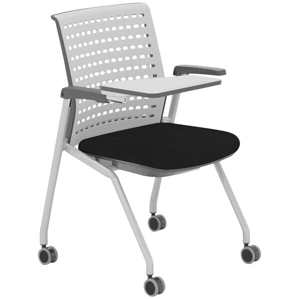 A gray Safco Thesis training chair with a tablet arm on wheels.