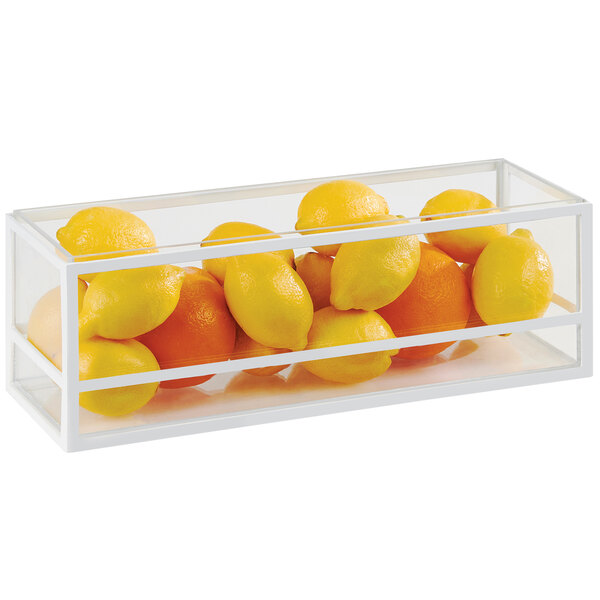 A white rectangle Cal-Mil presentation case with lemons and oranges inside.