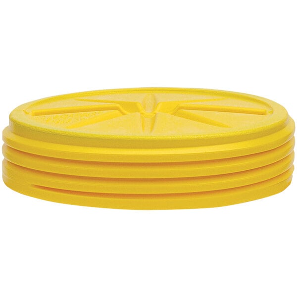 A yellow plastic Eagle Manufacturing lab pack drum lid with four holes.
