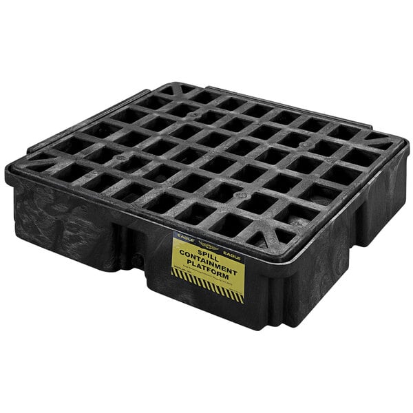 A black plastic Eagle Manufacturing spill containment platform with holes.