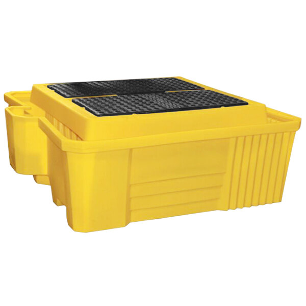 A yellow and black Eagle Manufacturing IBC containment unit.