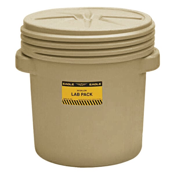 A close-up of an Eagle Manufacturing beige lab pack plastic barrel with a yellow and black label.