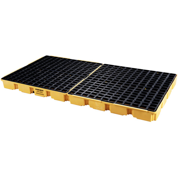 A yellow and black plastic Eagle Manufacturing spill platform with black squares.