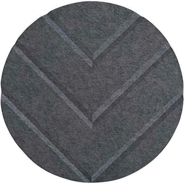 A dark grey round Versare SoundSorb wall panel with a chevron circle pattern.