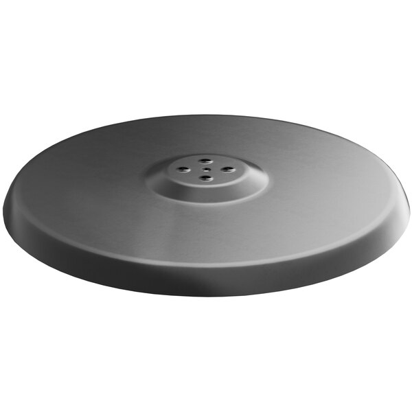A round black metal table base plate with holes.