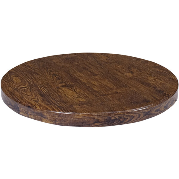 An American Tables & Seating round vintage walnut faux wood table top.