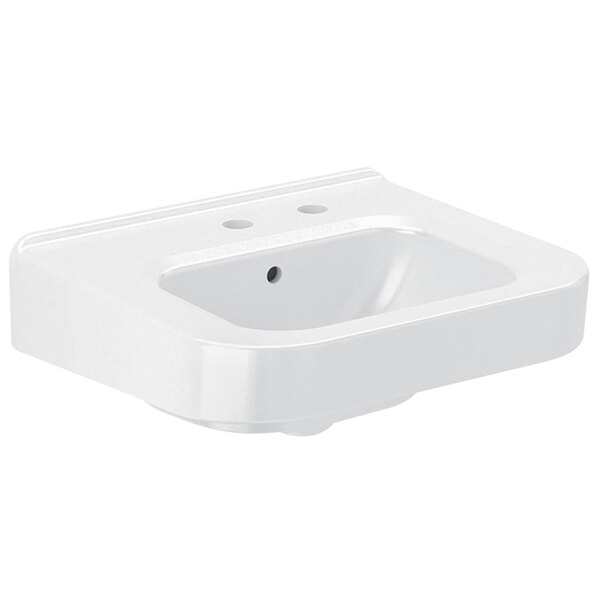 A white Sloan wall mounted sink with a right hand soap hole.