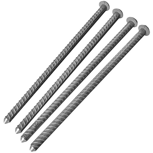 A close-up of three metal spikes of different sizes.