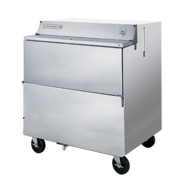 A Beverage-Air stainless steel milk cooler on wheels with a door.