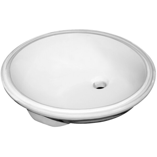 A white vitreous china oval undermount sink with a hole in it.