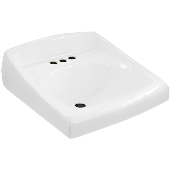 A white vitreous china Sloan wall mounted sink with three holes.